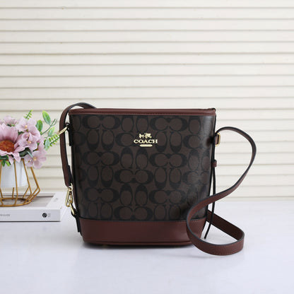 Jude Duffle Bag In Signature Canvas